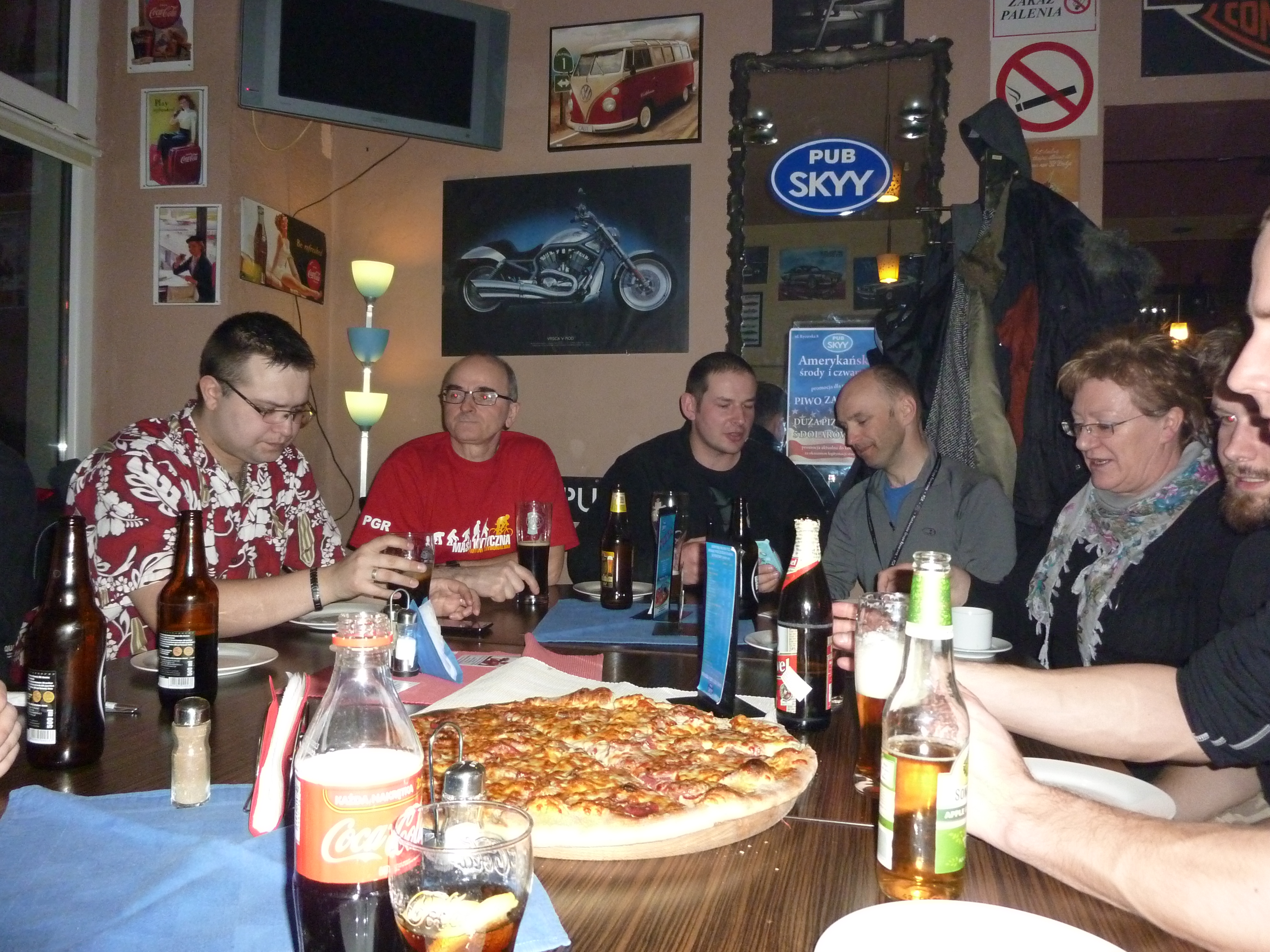 Having beer, pizza and interesting discussions.