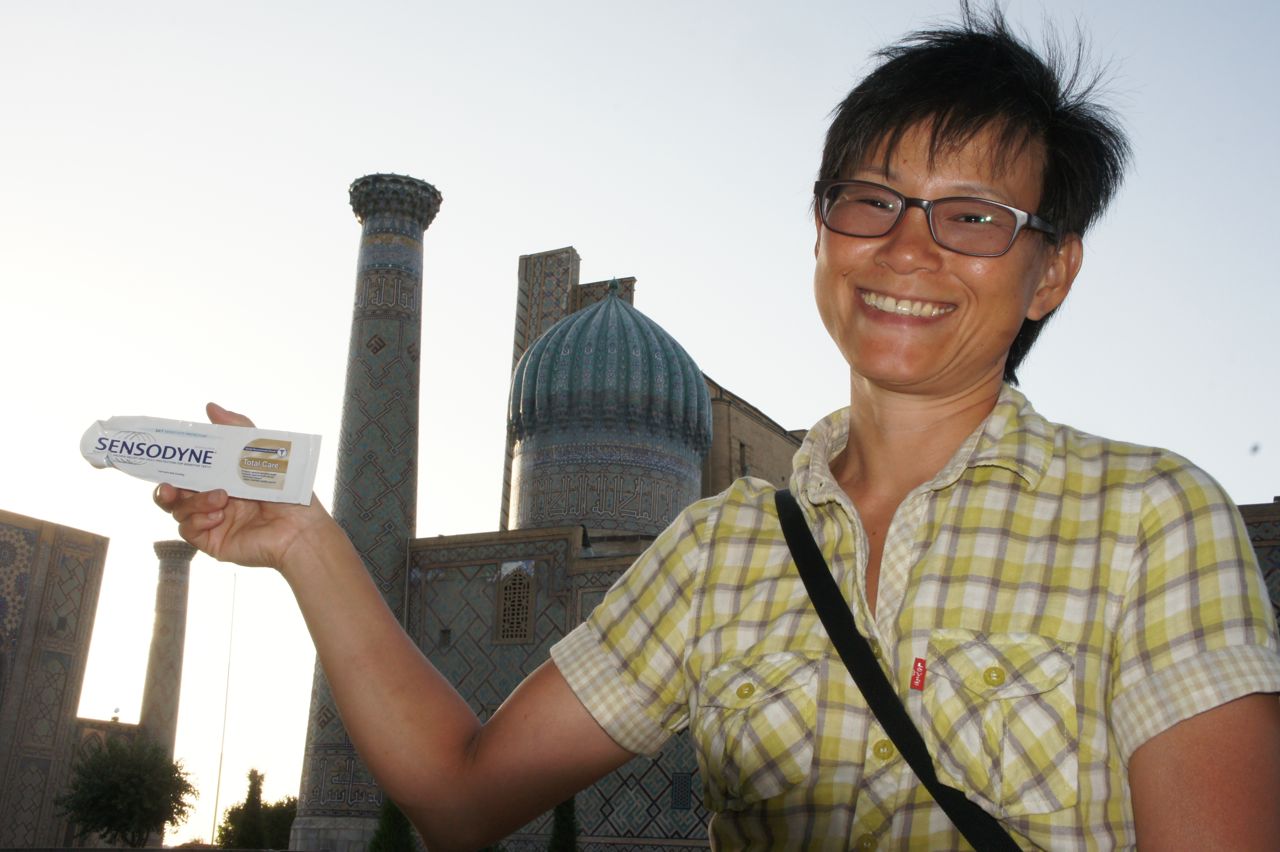 Wej with the empty toothpaste tube outside Samarkand's most famous landmark - the Registan